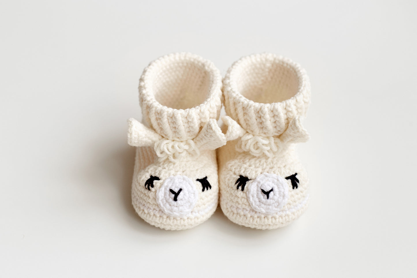 Pregnancy announcement off white llama booties gift box