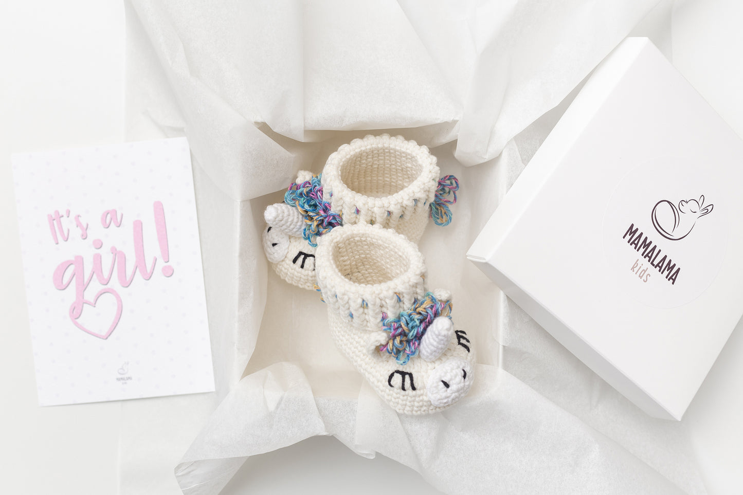 Baby girl shower gift box with crochet unicorn booties